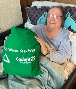 Homeline recipient Yvonne with green doctors bag